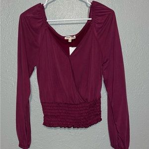 Size Medium, Magenta top from Dry Goods